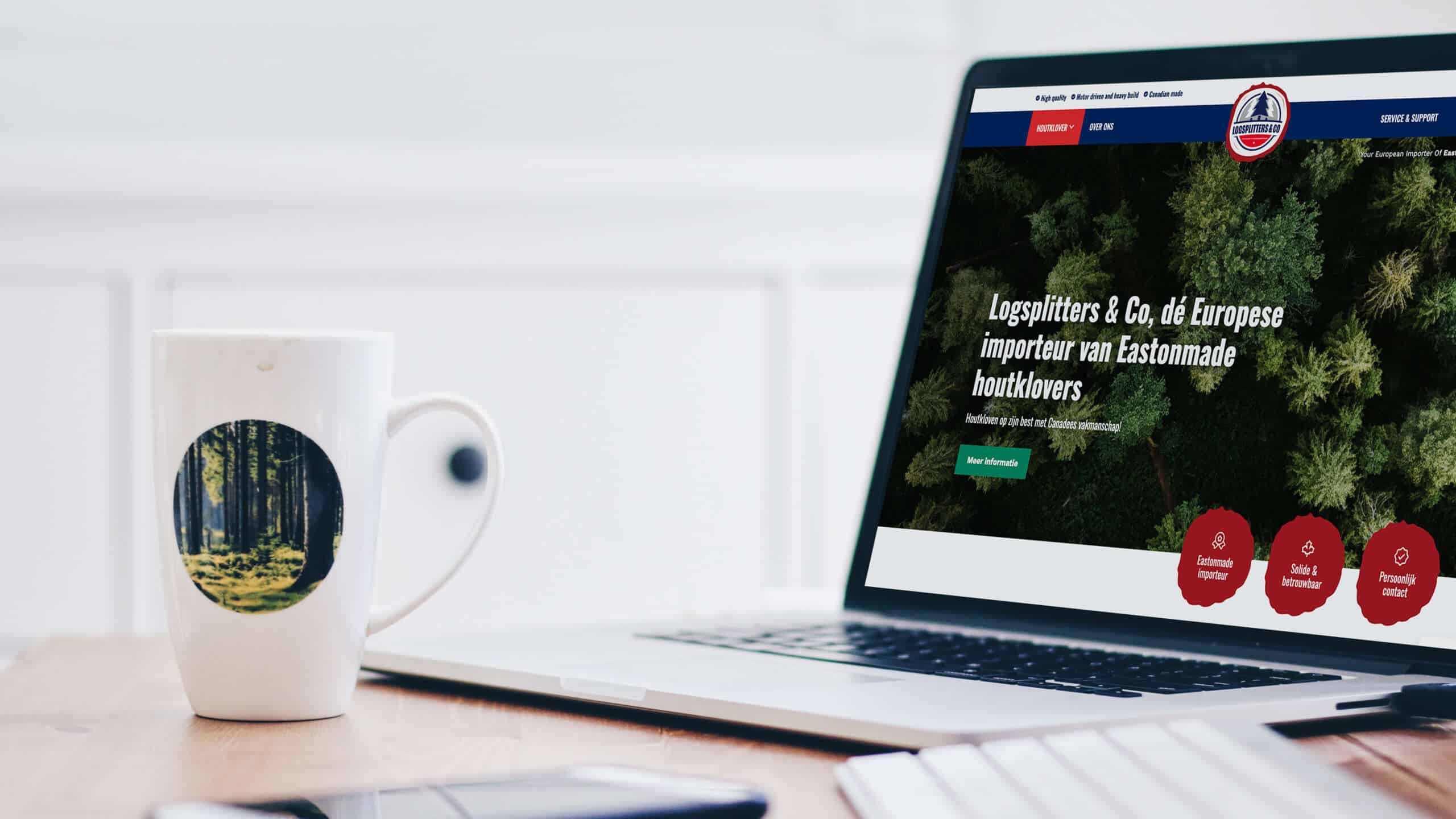 Weergave van de Logsplitters & Co homepagina op een laptopscherm.